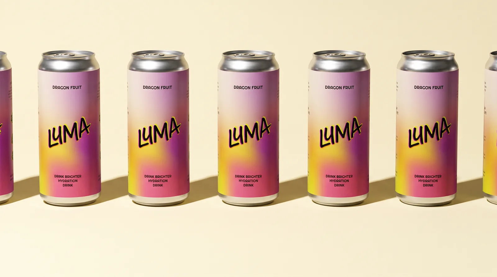 Seven Luma cans in a receding row on cream